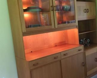 China Cabinet with lights on.