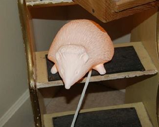 Hedgehog lamp on closet steps