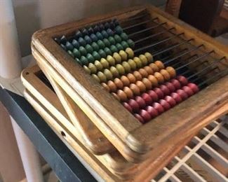Several vintage abacus