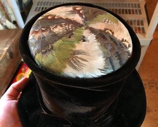 This is a gorgeous feathered hat look at those designs