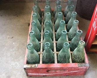 Coca-Cola bottles in crate