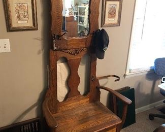 Beautiful antique hall tree with umbrella holder and drip pan
