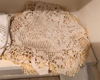 Tons of vintage doilies and handmade crochet