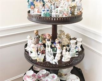 Figurines, cups and saucers (stand not for sale)