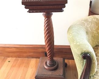 Carved mahogany stand