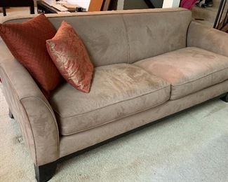 Comfortable sofa in a neutral fabric. 