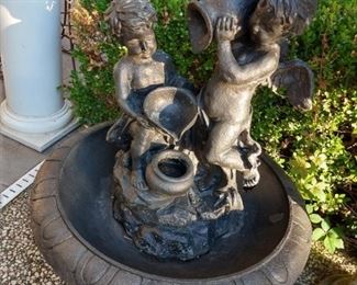fountain with cherubs