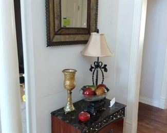 small chest mirror and lamp