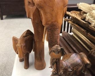 A COLLECTION OF WOOD CARVED ANIMALS 