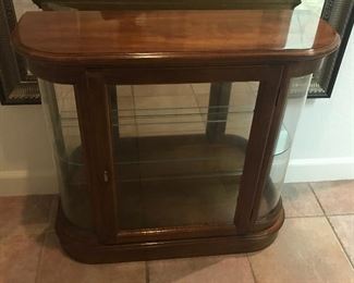 Console with glass shelves and doors