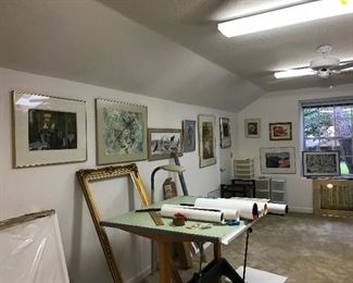 Drafting table, paintings and storage