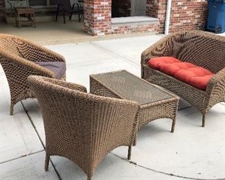 Wicker loveseat, 2 chairs and coffee table