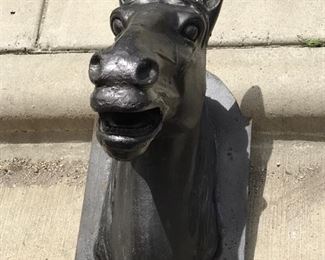 One of 2 cast iron horse heads