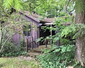Rustic House tucked in the woods....front.