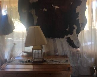 Large hide and table. Both are sold