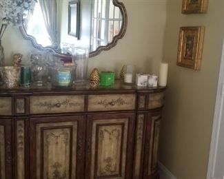 credenza and mirror and all decorative pieces