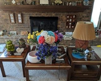 coffee table with matching end tables, cookie jars, lamps, flower arrangements