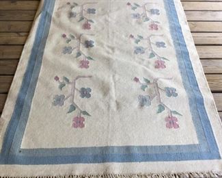 Area rug approximately 5’x7’