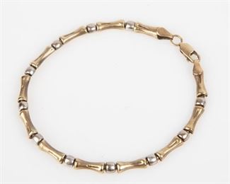 62: 14K Two Tone Gold Baton and Barrel Links Bracelet