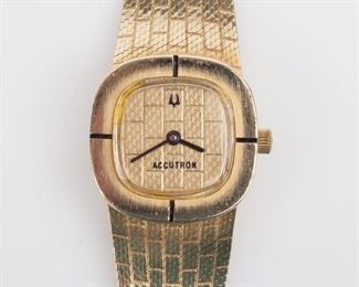 65: 14K Accutron Bulova Quartz N2 Watch