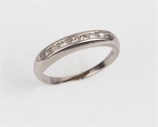 76: Platinum Ring with Seven Channel-Set Diamonds