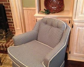 One of two checked club chairs 