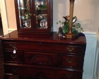 This elegant blanket box/cedar chest opens from the top; small curio cabinet.