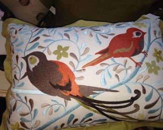 Embroidered bird pillow