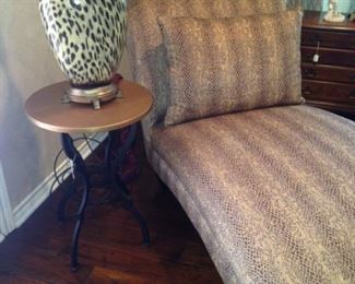 Leopard print fabric chaise and lamp