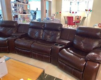 4  leather Theater recliner chairs w/2 flip up storage boxes & 4 cup holders - all 4 chairs recline and the 2 end chairs rock - Couch is from Macy's and in perfect condition 