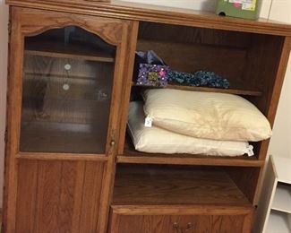 Entertainment Center Small has Wheels Easily Moved About