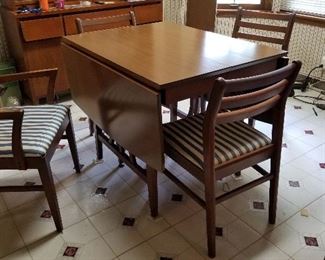 #100	Table	Mid Century drop side dining table w 4 Chairs 	 $275.00 
