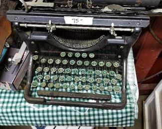 #59	Antique Typewriter w/ green glass keys 	 $75.00 
