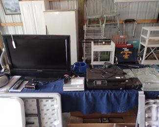 Dynex T.V. DVD Player.Printer. Antenna Rotor. Lawn Chairs.Old Wooden Chairs. Stadium Seats.