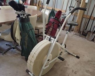 Exercise Bike. Golf Bags.