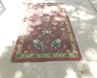 One of 3 Rugs