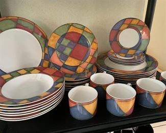 Beautiful dinnerware set, has art deco design.