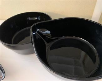 Ceramic bowls that connect, but are separate. 