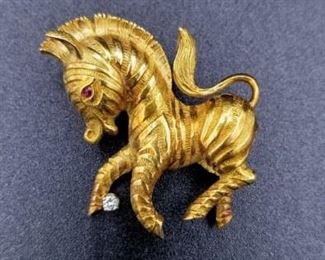 18K gold Zebra pin with ruby and diamond