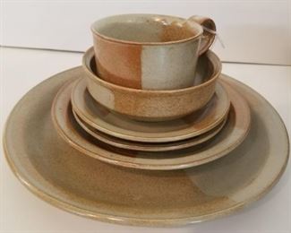Iron Mountain Stoneware, service for 12 - coffee creamer has  a small chip, one dinner plate has a small chip, otherwise perfect set