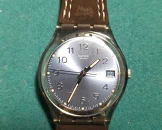 Swatch watch with brown leather band, model 711