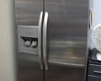 Kenmore Elite Stainless Steel Fridge model # 106.44033603, owner states that the fridge makes ice but that the ice dispenser doesn't work (water dispenser works fine) - located in garage