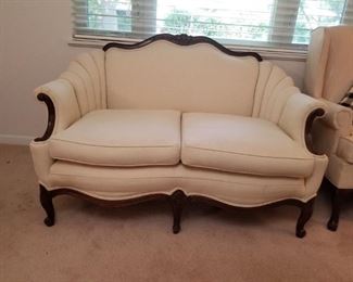 Lovely cream colored love seat