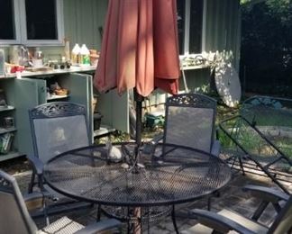 Patio set with umbrella and four chairs