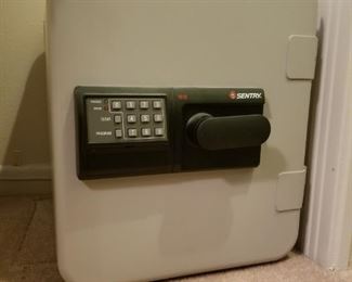 Sentry safe model #1610, it works and we have the combination.