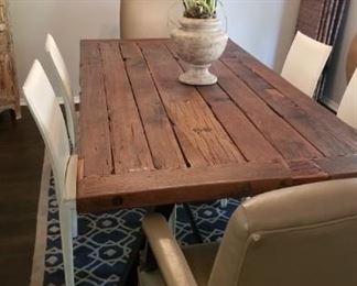 Beautiful dining table - reclaimed wood mounted on railroad metal legs - measures 84" x 40"