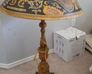 leather table lamp - the photo does not do this justice - lamp shade appears hand painted and body of lamp is accented with leather