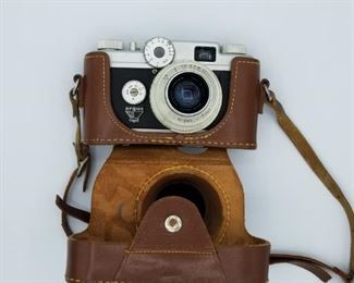 Argus C-Four camera and snap-on leather case