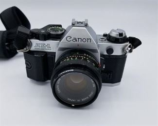 Canon AE-1 camera with lens