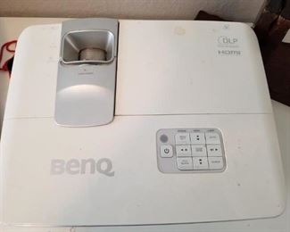 Benq home projector. Turns on, but fan is very loud. Needs work. Sold as is.